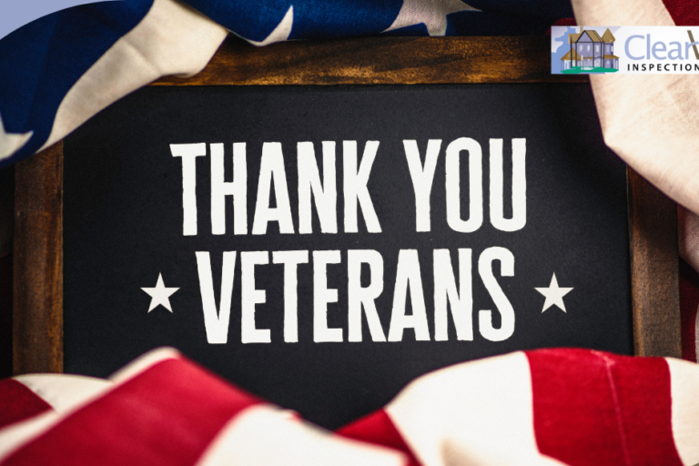 Clear View Inspection Group (5) Chalkboard sign with 'Thank You Veterans' message, wrapped in the American flag