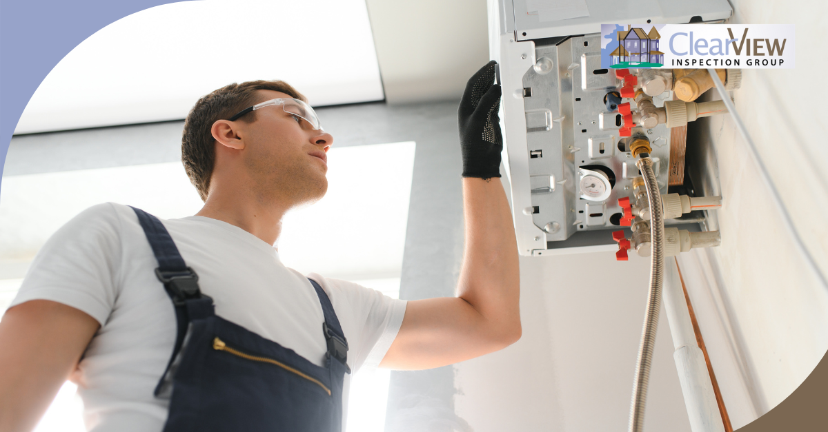 Inspector examining a water heater system while wearing protective gloves and goggles.